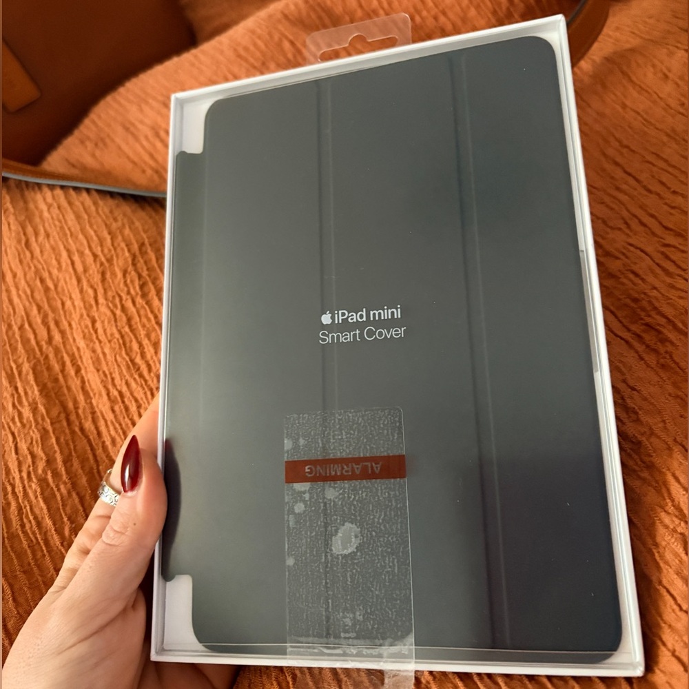 iPad mini Smart Cover 5th gen. 
New in the box. Tried on, never used.